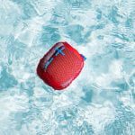 red and blue swimming cap on water